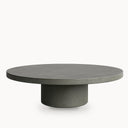 Round concrete coffee table with pedestal base handcrafted by Curated Concrete
